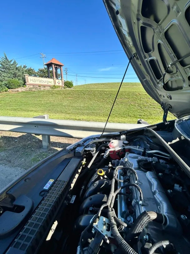 Mobile mechanic in Harrisburg NC working near the Welcome to Harrisburg sign