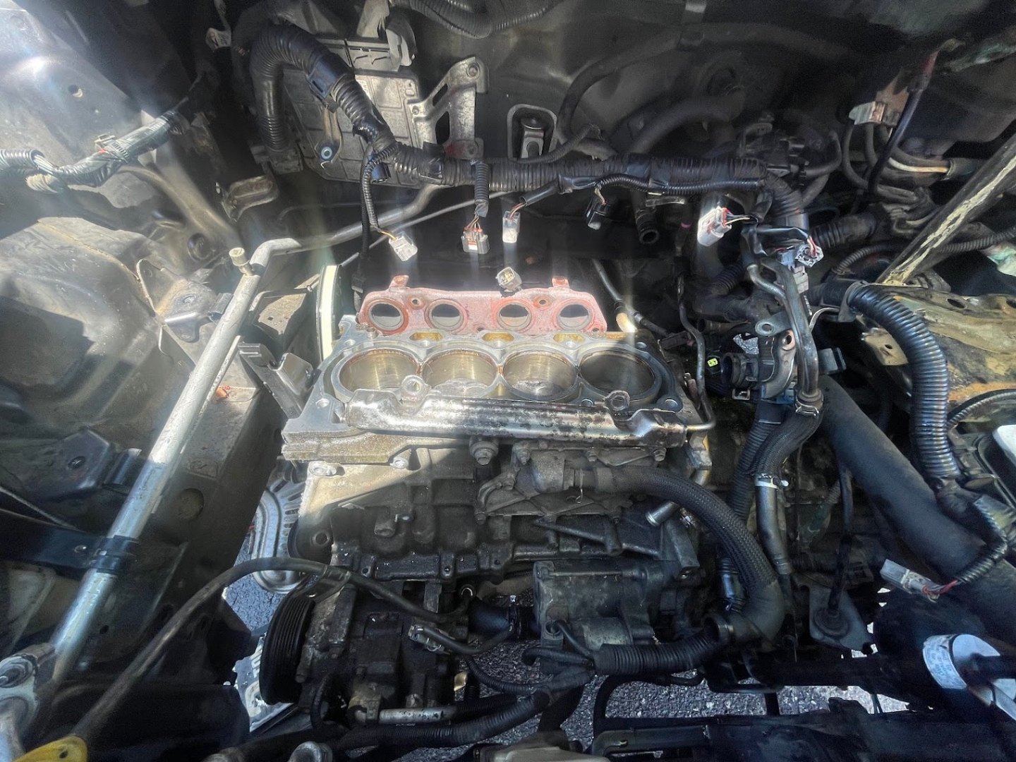 Mobile auto repair engine teardown and cylinder head diagnostic work
