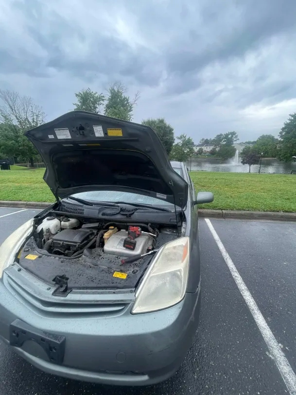 Mobile mechanic service near Pineville Lake Park in Pineville NC 28134 with hood open diagnostic work